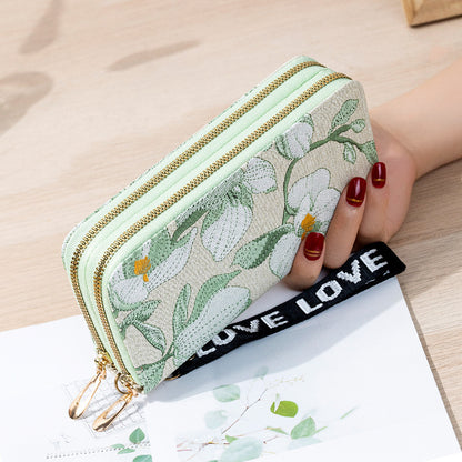 Cartera larga de gran capacidad con doble cremallera y diseño de flores