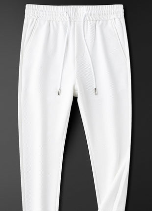 Pantalones blancos elásticos de sarga para hombre