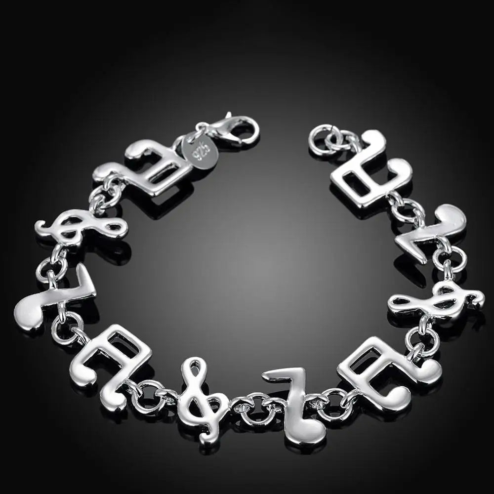 Pulsera con notas musicales nuevas, exquisita y plateada con adorno creativo popular