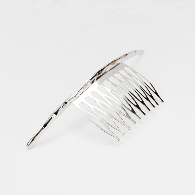 Curved hair comb