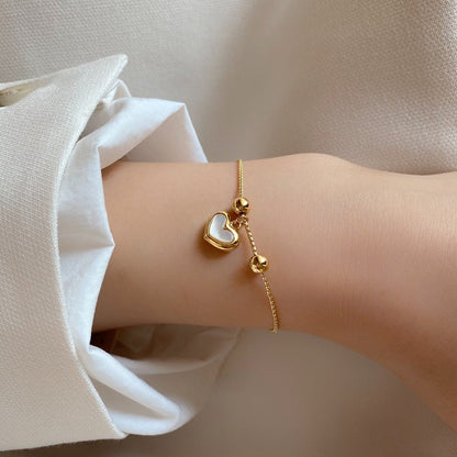 Pulsera de cuentas ajustables con forma de corazón de melocotón y fritillaria blanca de concha