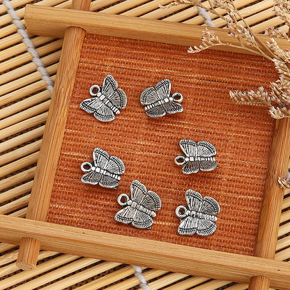 New Retro Alloy Butterfly Hollow Lucky Tree And Other Multi-element Carving Pattern Small Pendant