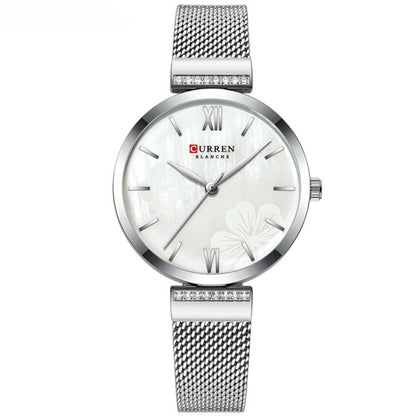 Montre à quartz simple en alliage tendance pour femme