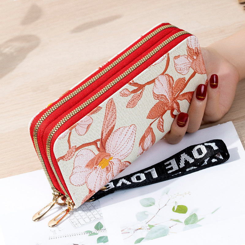 Cartera larga de gran capacidad con doble cremallera y diseño de flores