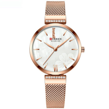 Montre à quartz simple en alliage tendance pour femme