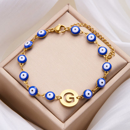 Just Arrived at Buy Center: Women's High-grade Stainless Steel Blue Eyes Fashion Hollowed-out 26 Letter Bracelet G