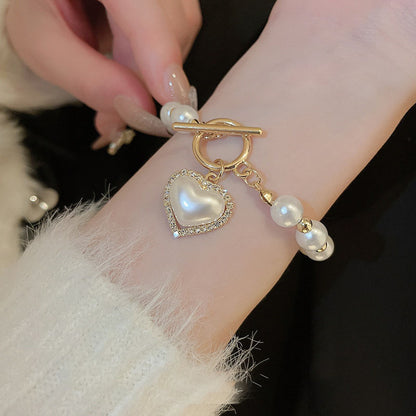 Hot New Items at Buy Center: Diamond OT Buckle Pearl Heart Bracelet