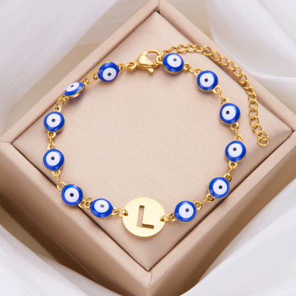 Just Arrived at Buy Center: Women's High-grade Stainless Steel Blue Eyes Fashion Hollowed-out 26 Letter Bracelet L