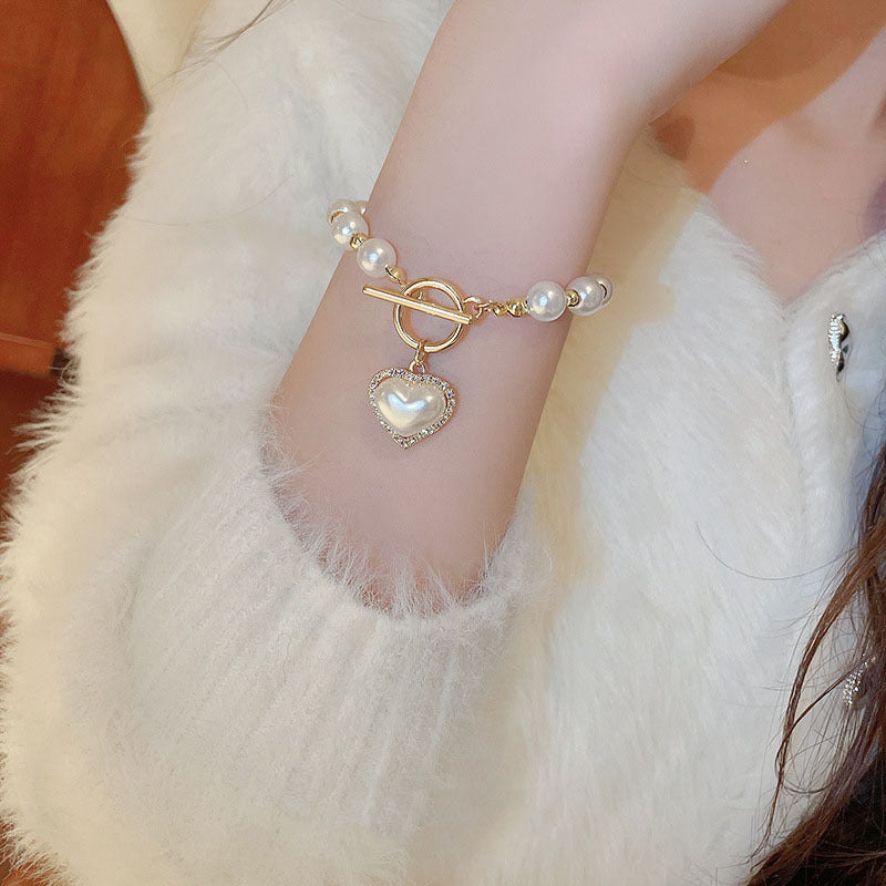 Hot New Items at Buy Center: Diamond OT Buckle Pearl Heart Bracelet