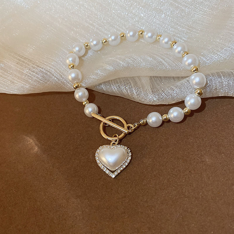 Hot New Items at Buy Center: Diamond OT Buckle Pearl Heart Bracelet