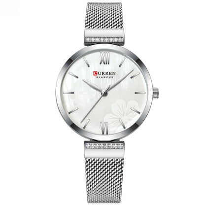 Montre à quartz simple en alliage tendance pour femme