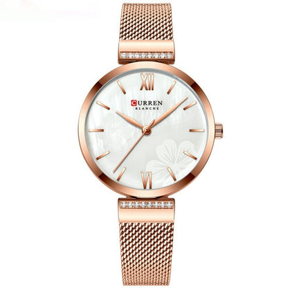 Montre à quartz simple en alliage tendance pour femme